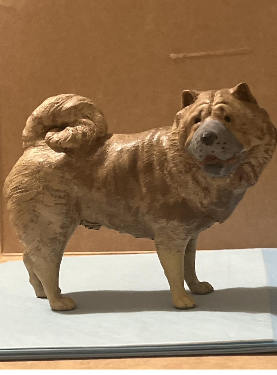 Dog sculpture before and after comparison